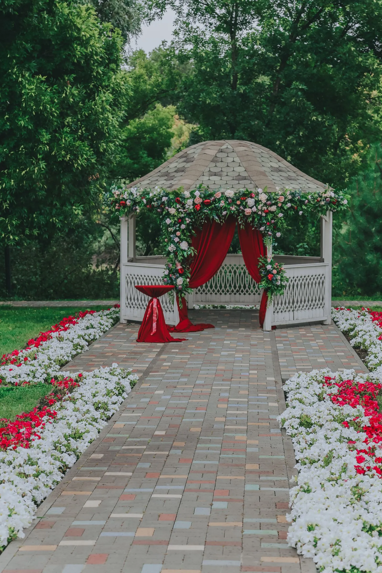 Garden gazebo decorated for an outdoor reception